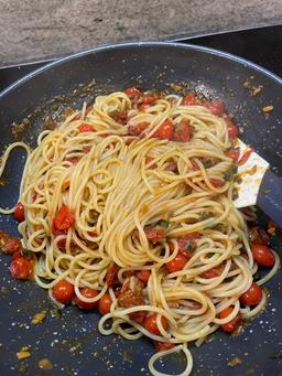 Burst cherry tomato and miso pasta with sesame crunch