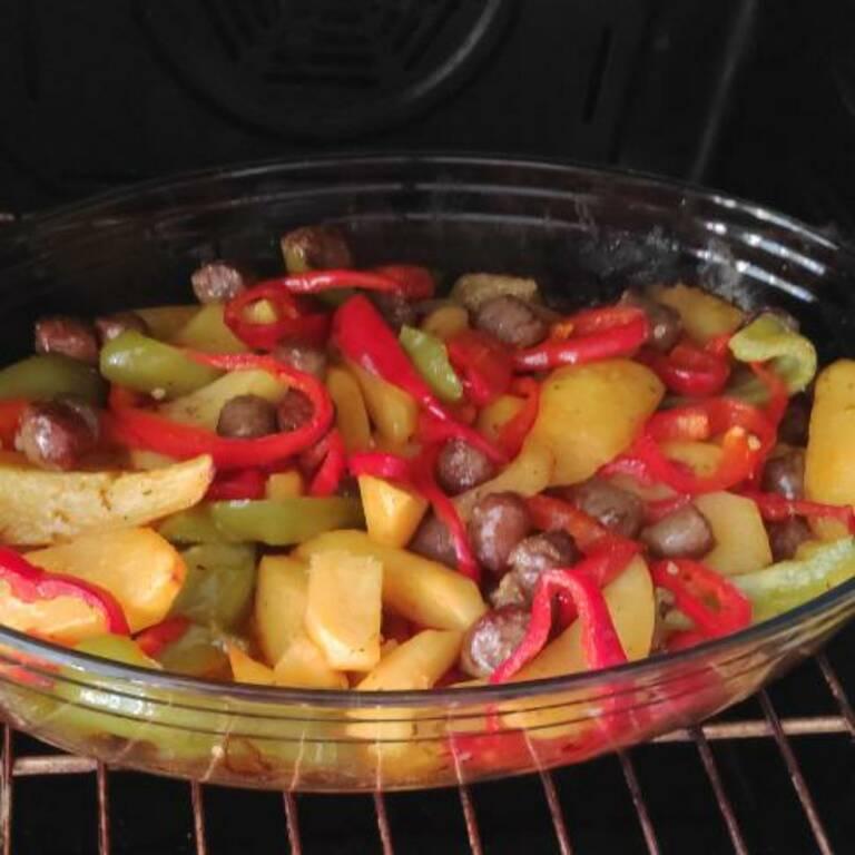 Baked Sausages with potatoes and colourful peppers