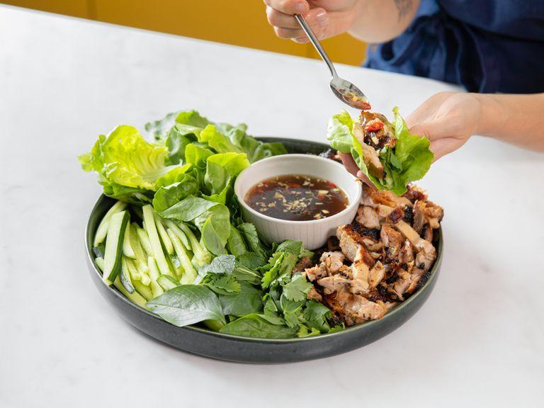 Slice chicken and add to the platter with the vegetables and lettuce. Serve lettuce wraps with the nuoc cham dipping sauce and plenty of fresh herbs. Enjoy!