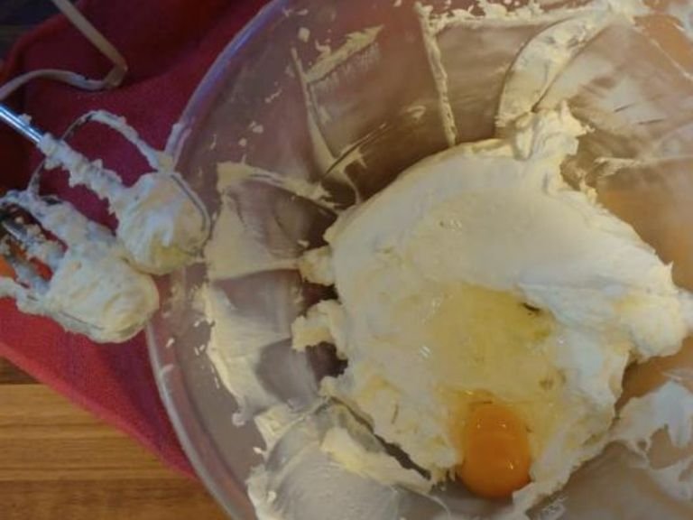 Using and electric whisk, whisk the ricotta and mascarpone together for 3 minutes. Add the eggs, one by one, adding the next egg after the previous has been fully incorporated. After you have added all the eggs, whisk for 5 minutes.