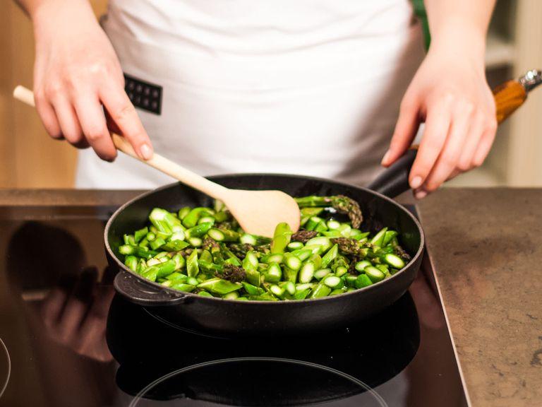 Heat up some olive oil in large frying pan and fry asparagus pieces at moderate heat for approx. 8 – 10 min. until tender. Season with salt and pepper.