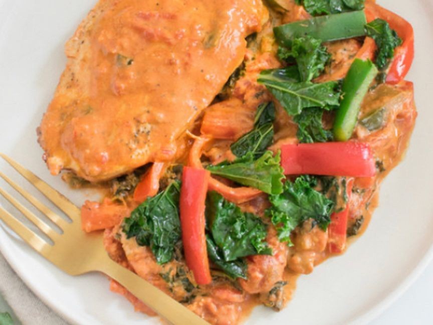 Creamy Cajun chicken with kale & bell peppers