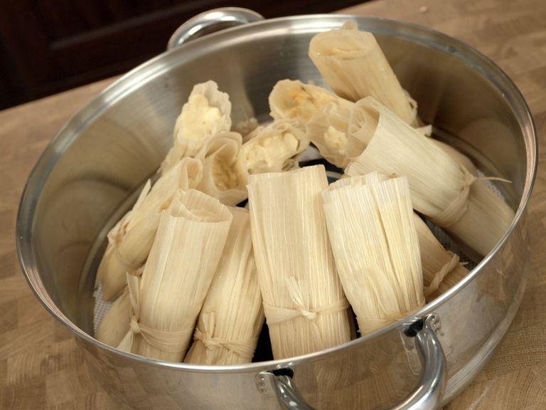 Place all tamales in the steamer tray/bowl. If they are too long, place an empty heat proof bowl in the middle and lean tamales on it