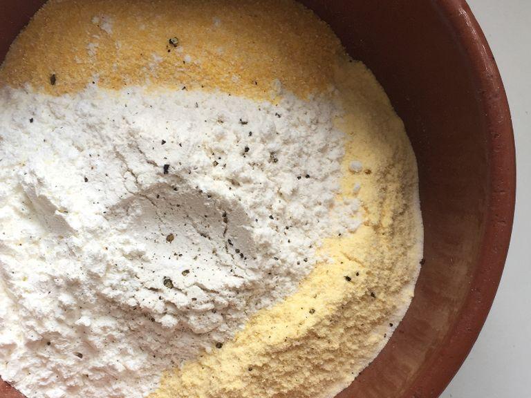 in a bowl combine all the dry ingredients. Stir and form a well.