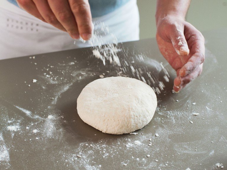 Turn out dough onto a floured work surface and knead until dough is smooth, but firm. Transfer back to floured bowl, cover with kitchen towel, and store in a warm, dry place for approx. 1 – 2 hours until dough has doubled in volume.