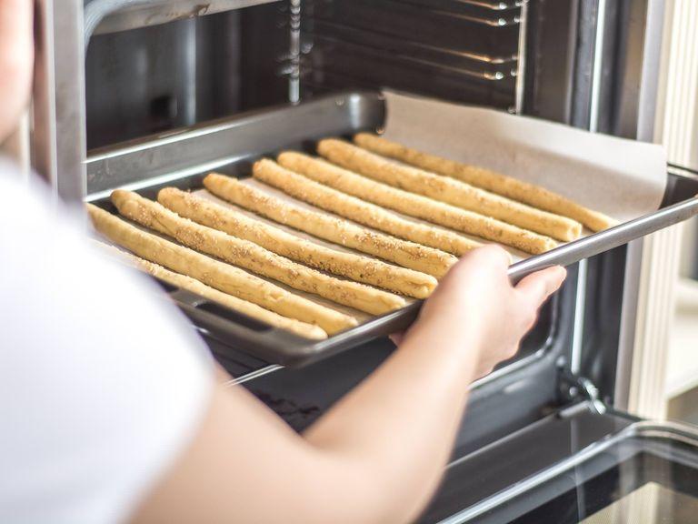 Meanwhile preheat the oven to 200°C/ 390°F. Bake the grissini in the preheated oven for approx 10 min until golden. Allow to cool for approx. 10 min. Serve with a selection of dips.