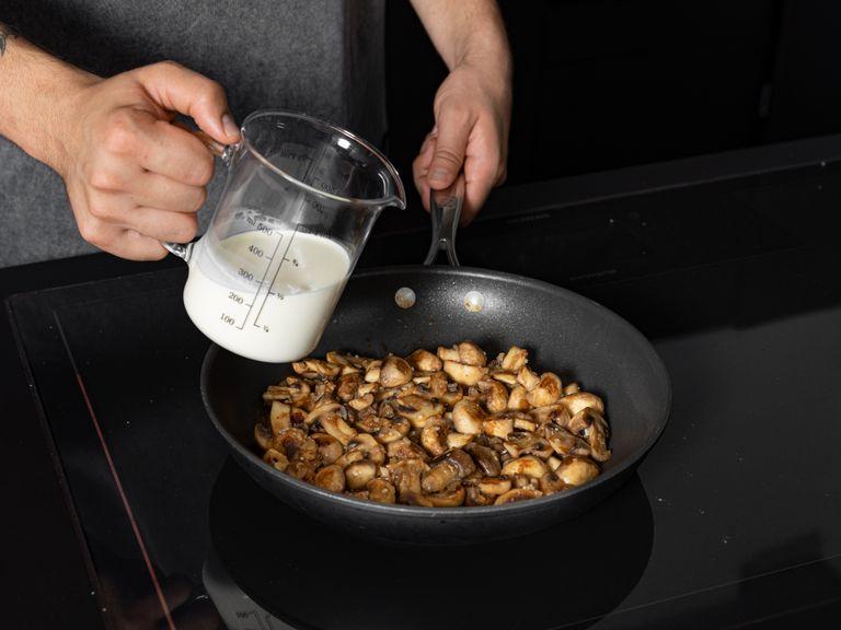 Add some of the flour and sauté for approx. 1 min. Deglaze with chicken stock and heavy cream, and season with salt and pepper to taste. Let the mushroom gravy simmer over low heat while you cook the schnitzel.