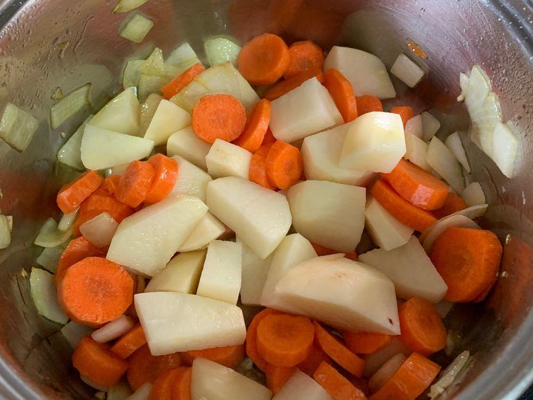 Add the potato and carrots and leave it on medium heat for 15 minutes or until soft.