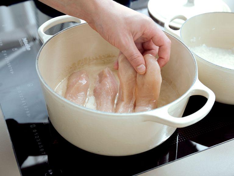 Reduce heat to medium, then add chicken breasts to saucepan and let simmer for approx. 5 min.