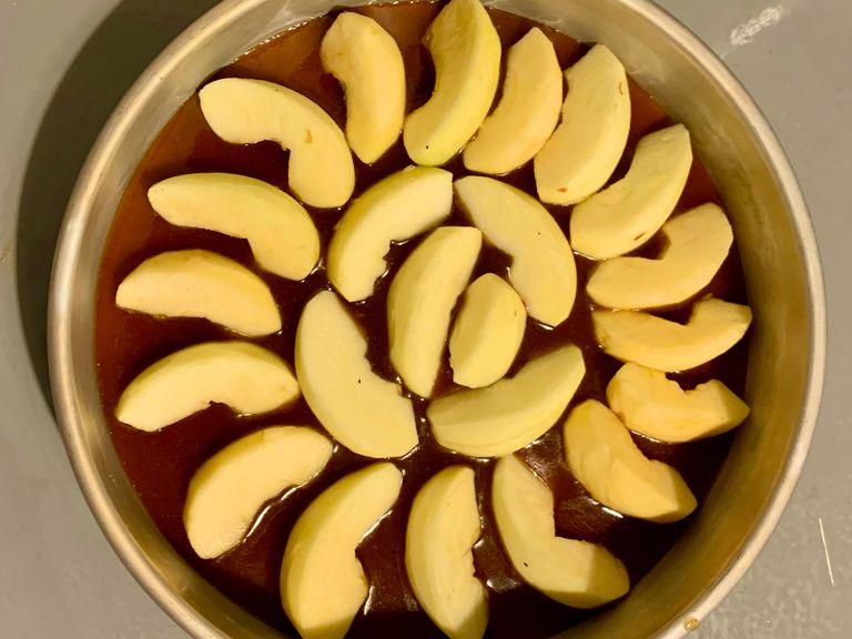 Peel and cut the apples and put them over the caramel sauce. 
You can slice the apples to the thickness that you want.