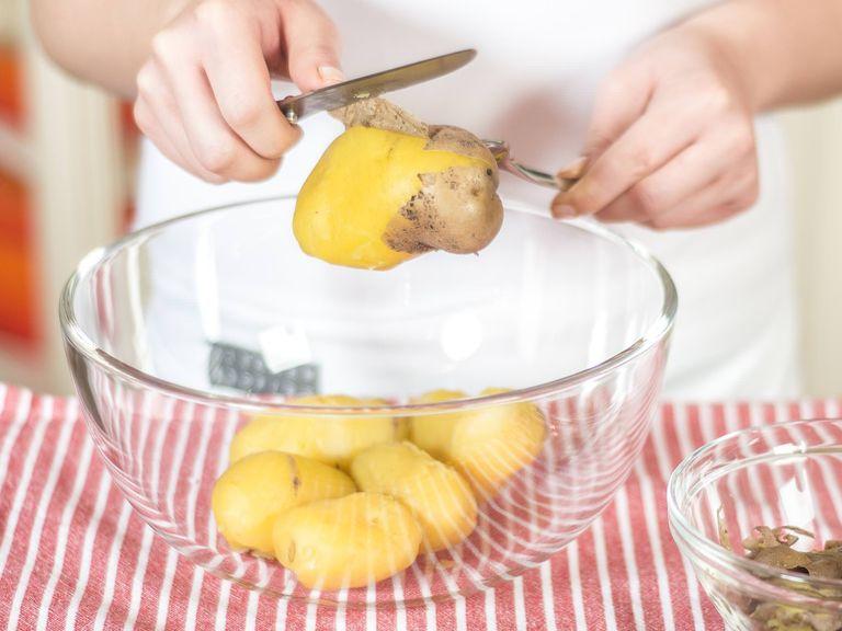Boil potatoes in salted, boiling water for approx. 20 - 30 min., according to size. Drain and peel.