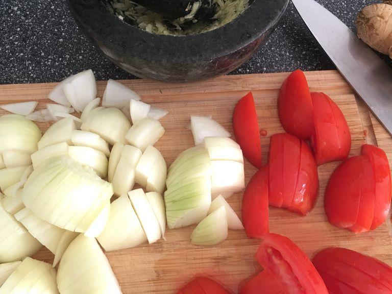 Roughly slice the onions and tomatoes. Crush/chop ginger and garlic. I usually prefer freshly ground ginger garlic paste for which I use my all-time favourite mortar and pestle.
