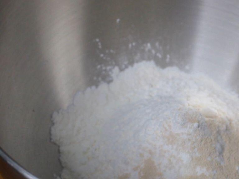Combined the dry ingredients. (bread flour and active dry yeast) Whisk together until combined.