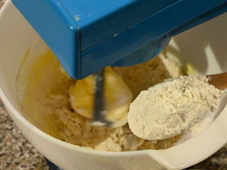 Add in the flour and continue mixing on low speed to form a smooth paste.  Add cinnamon and nutmeg.