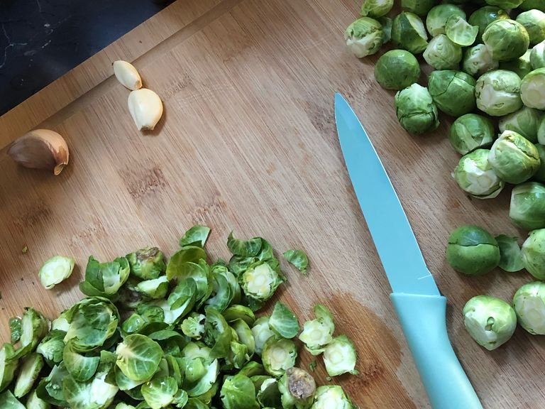 Wash, cut off ends & peel outer leaves of Brussels sprouts