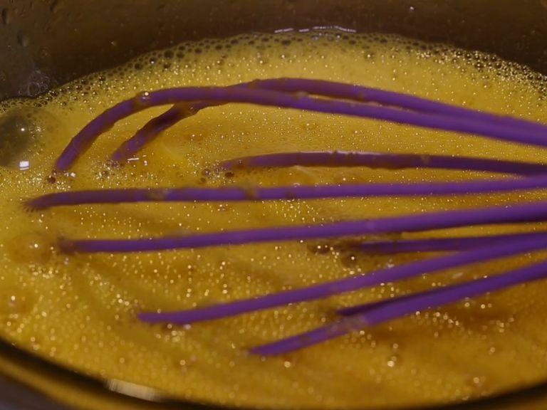 Add sugar, orange juice to the yolks and mix everything. Put on a water bath and stir constantly until the mixture begins to thicken