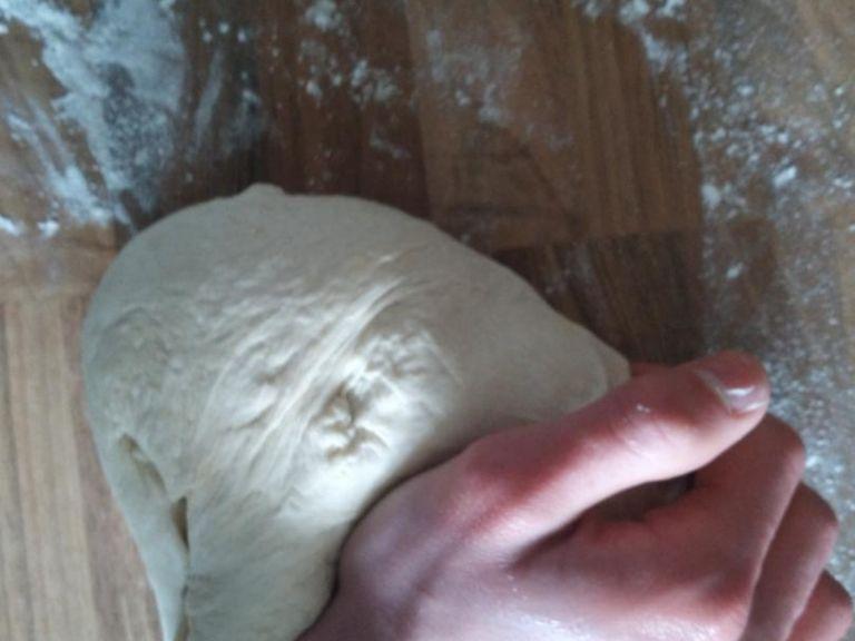 Knead the dough again for about 3mins on a lightly floured surface, adding a tiny drop more water and working it into the dough to ensure the it remain moist (although if it is already quite wet, don't do this - only use this recipe as a general guide). Lightly oil the bowl again, cover in lightly oiled cling film, and leave to rise in the fridge overnight.