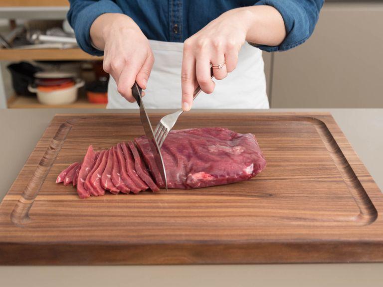 Wrap beef in plastic wrap and freeze for approx. 1 hr. for easier slicing. Cut beef against the grain into thin slices. Place in large freezer bag or large bowl.
