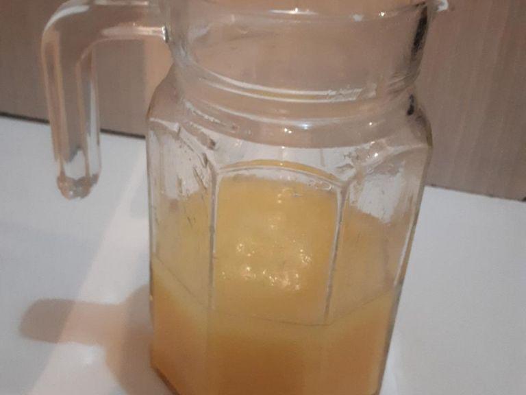 In a jug add oil and eggs. Whisk nicely until frothy. Then mix in hot water and vanilla extract.