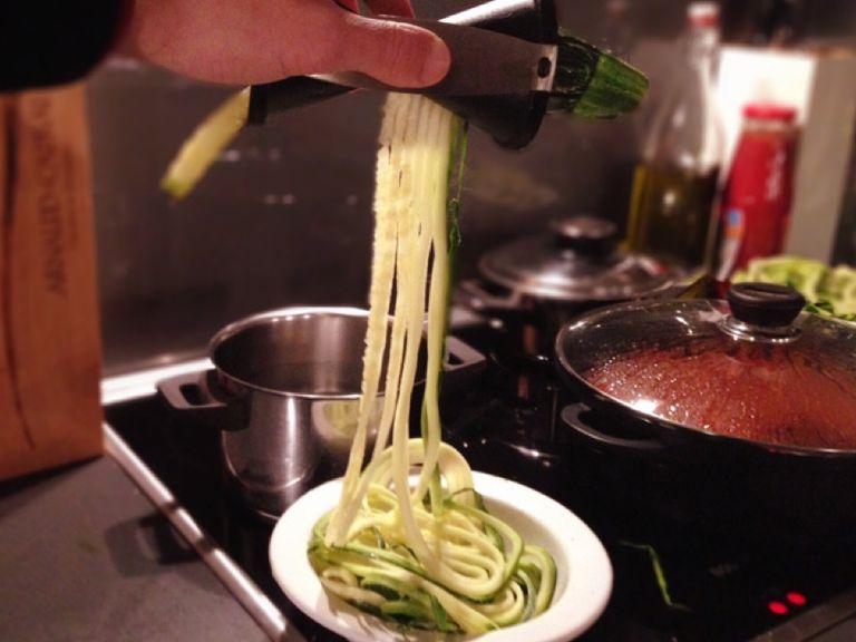 Use a spiralizer to shred zucchini into spaghetti-like noodles. Blanch zoodles in boiling water for approx. 2-3 min.
