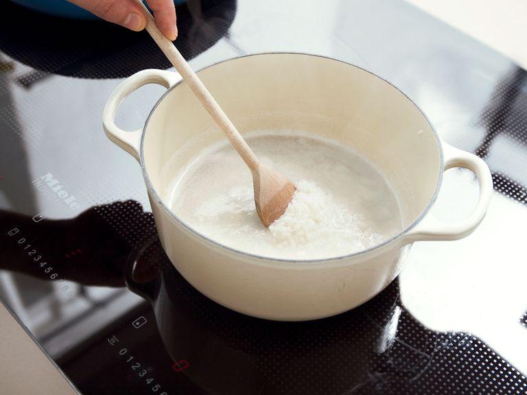 Add rice and water to a small saucepan with a pinch of salt. Bring to a boil, then reduce heat to low and let simmer for approx. 20 min. until cooked through. Set aside and keep warm.