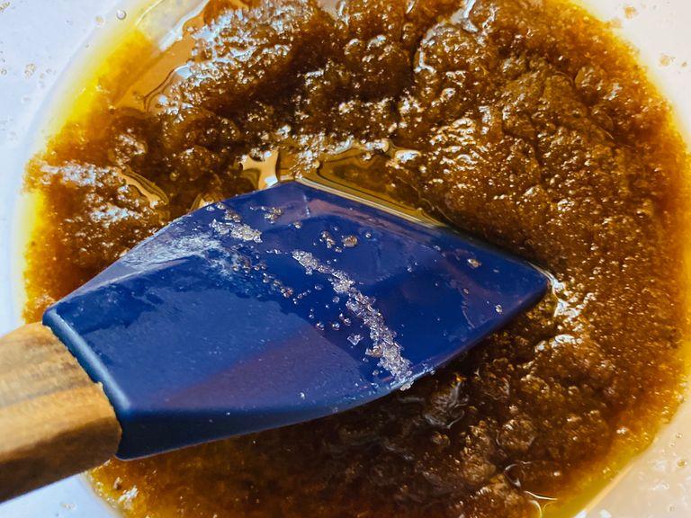 To begin Mix the melted butter with the brown and white sugar