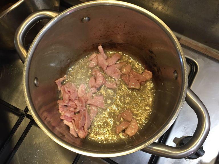 add the oil. Once it’s hot, add the bacon and fry till it’s cooked and brown. Remove the bacon