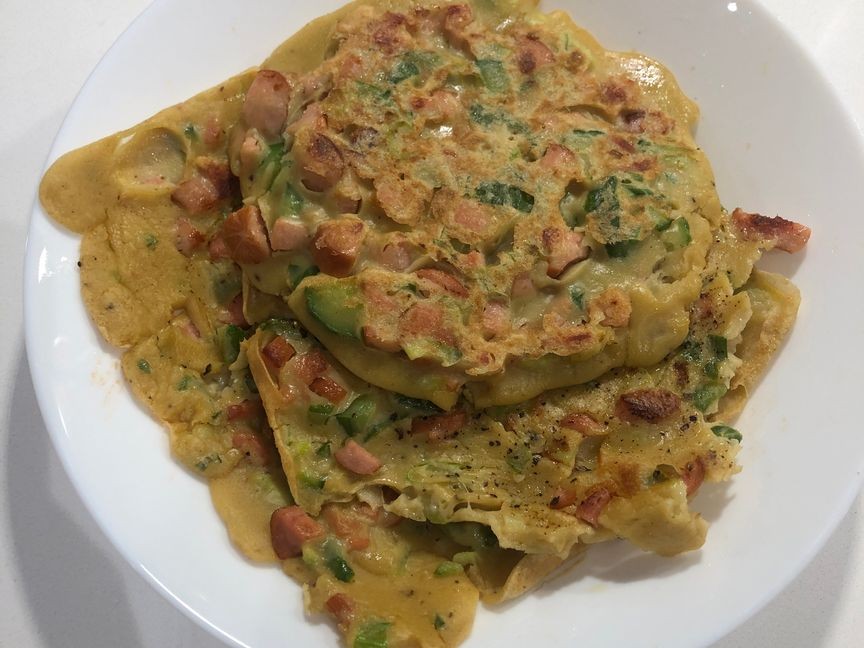 Chinese egg pancake with sausages and cucumber