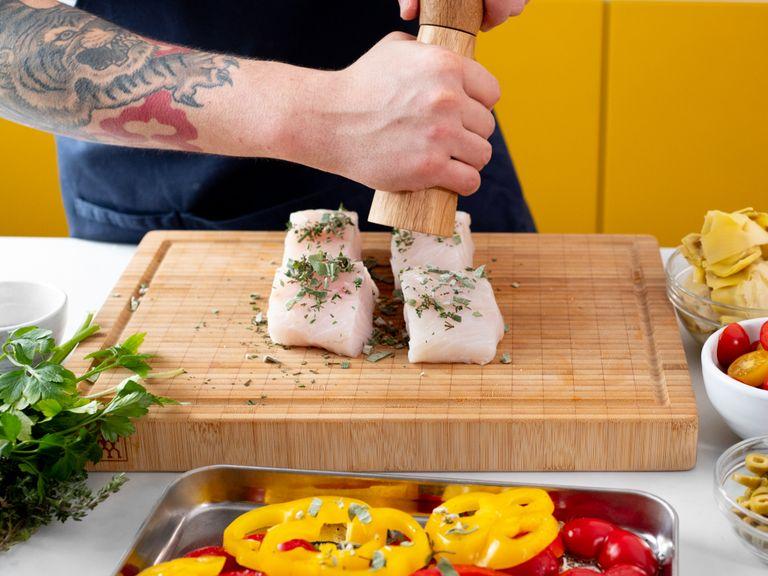 Season cod with some of the sage, thyme, salt, and pepper, and set aside. Transfer bell peppers to a parchment-lined baking tray and drizzle olive oil all over. Season with remaining herbs, salt, and pepper. Let roast in the oven for approx. 15 min.