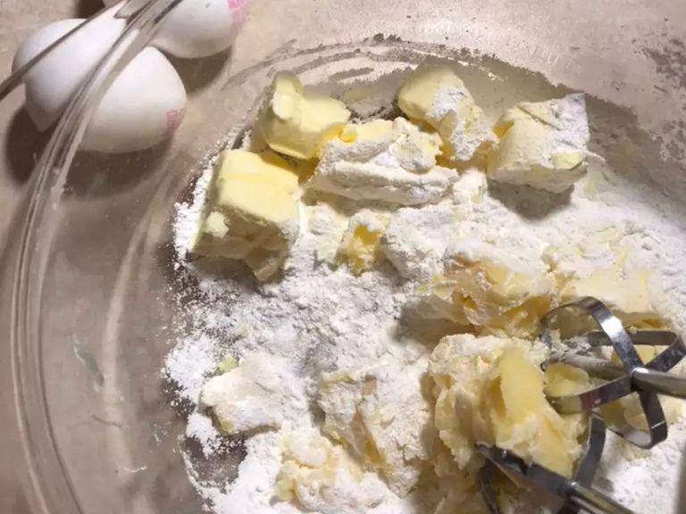 Mix butter and powdered sugar with electric mixer till smooth.