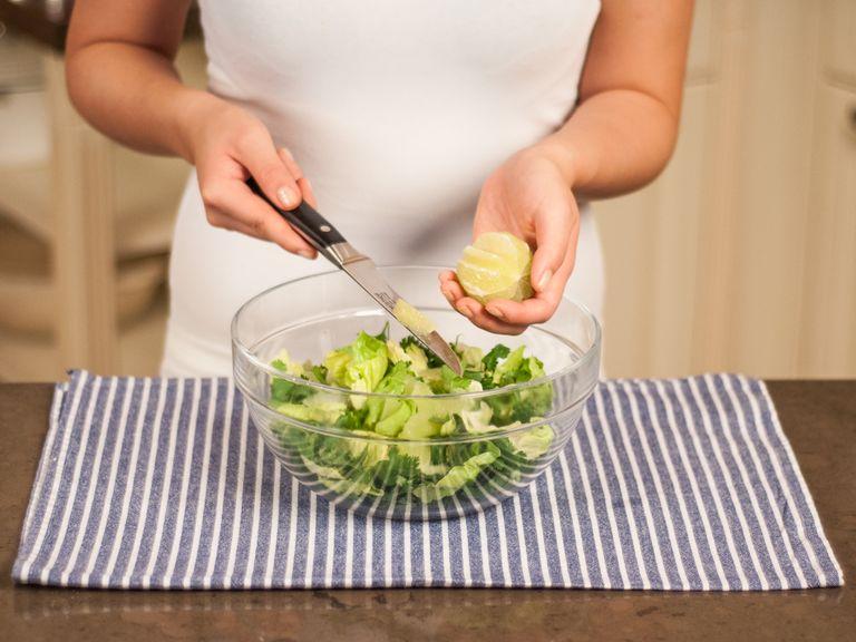 Tear romaine hearts into pieces. Segment lime and toss salad with chopped cilantro and lime wedges.
