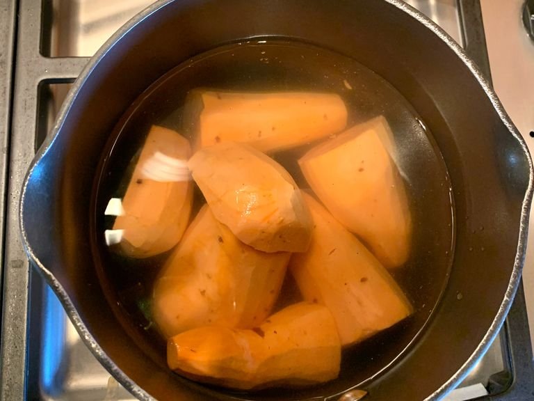 Peel the sweet potatoes, cut them in half and place them in a pot with boiling water for 30 minutes or until sweet potatoes are soft (you can check if they’re ready by pinching them with a fork).