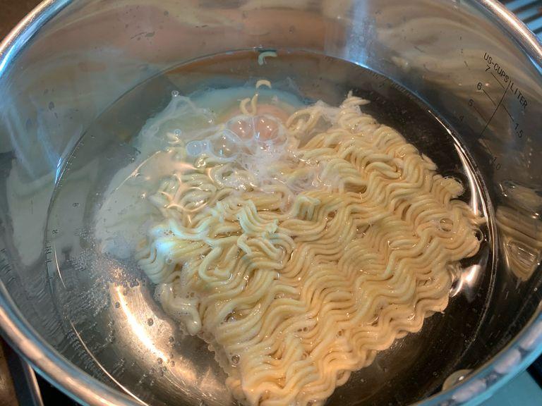 Pour the water in a cooking pot. Boil noodles and egg for 3 minutes over low medium heat. Be careful - watch the noodles, don’t let it soggy.