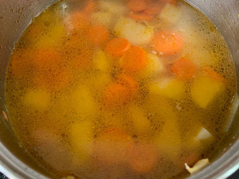 Add the broth and boil until all the vegetables are tender and complety cooked.