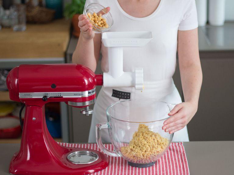 Combine all ingredients in a large bowl and then puree using a stand mixer with a food grinder attachment. Add flour and baking powder and knead into a firm dough.