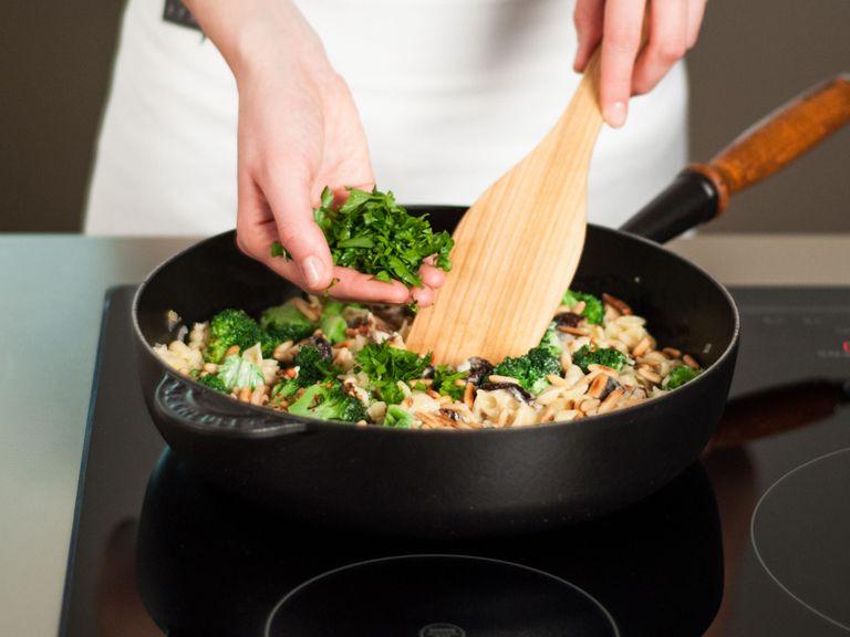 Add parsley and pine nuts to pan and stir until well incorporated. Enjoy!