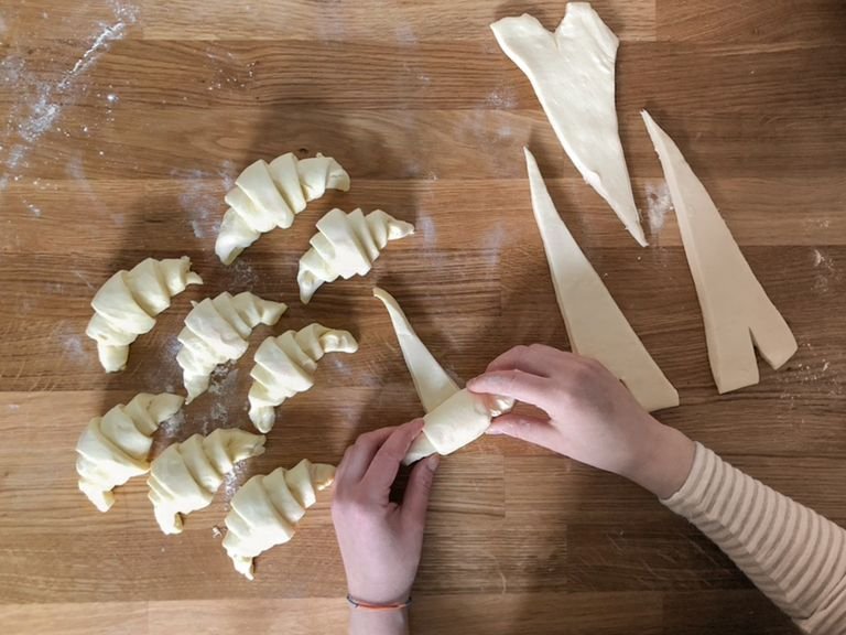 The croissants should have risen in volume. Now whisk the egg with milk and brush the croissants generously with it. Transfer to the oven and bake for approx. 10 mins. (if they get too dark, lower the temperature after 7 min. to 180°C/360°F). Serve with jam or dip straight into your coffee. Enjoy!
