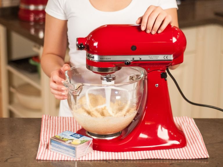 In a standing mixer or with a hand mixer, beat soft butter and brown sugar until pale and foamy.