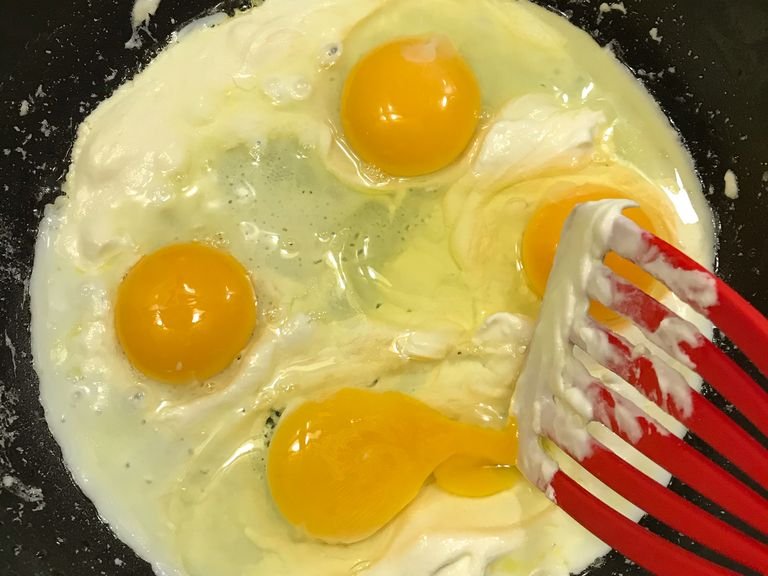 Add eggs. Break yolks. Stir after 2-3 minutes.