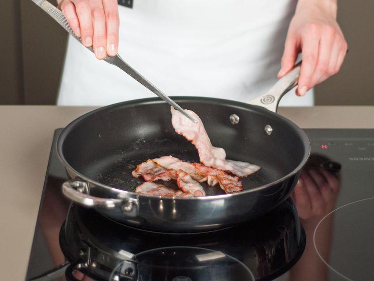 In a separate frying pan, sauté bacon over medium-low heat without any oil until slightly brown and lightly curled. The bacon should not be too crispy, as it needs to be flexible to fit into the muffin tin.