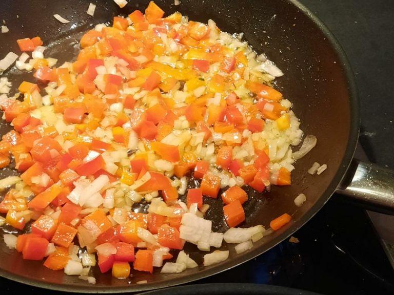 Finely chop onion, garlic, and bell pepper. Sauté them in the same pan until translucent, approx. 5 – 8 min.