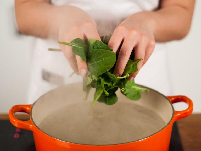 Add water to a large saucepan and bring to a boil. Blanch spinach for  approx. 1 – 2 min.