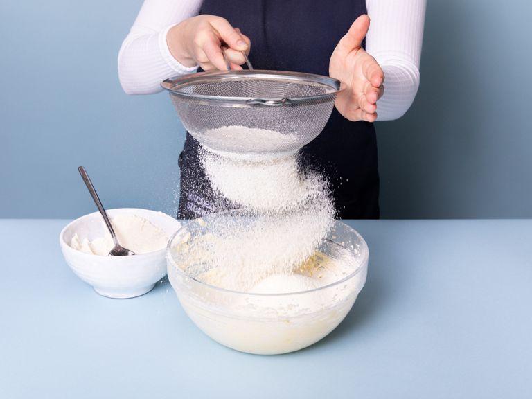 Preheat the oven to 180°C/350°F. Cream butter with most of the sugar until very light. Add egg and beat until just combined. Sift in most of the flour, baking powder, and a pinch of salt. Once combined, knead into a smooth dough with your hands.
