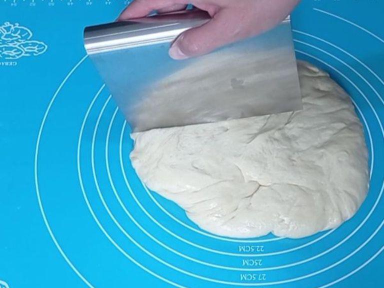 After 1 hour, open the kitchen towel and punch the dough to remove the air bubbles. Make the dough into a ball and divide the dough into 9 pieces. Form every dough into a ball and cover with kitchen towel. Let it rest for 10 minutes.