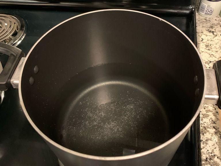 Start by bringing water to a boil. Add salt to the water.
