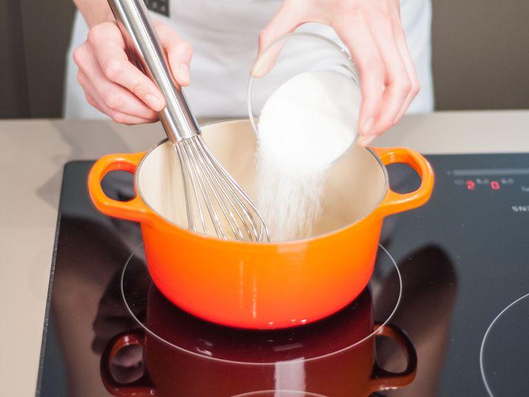 Add soaked gelatin along with water and sugar to a saucepan. Slowly heat mixture over medium-low heat, stirring constantly. Be careful not to overheat. Once the gelatin and sugar have completely dissolved, remove from heat and set aside.