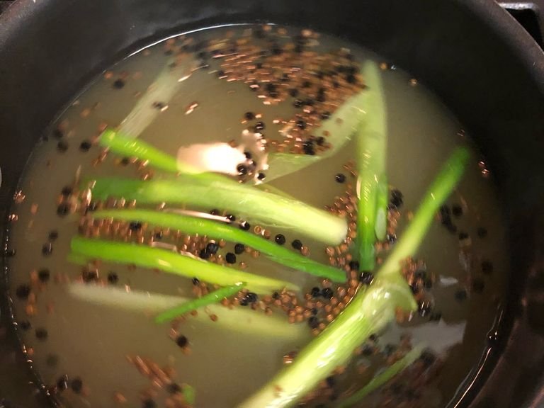 Add the hot water and chicken stock.