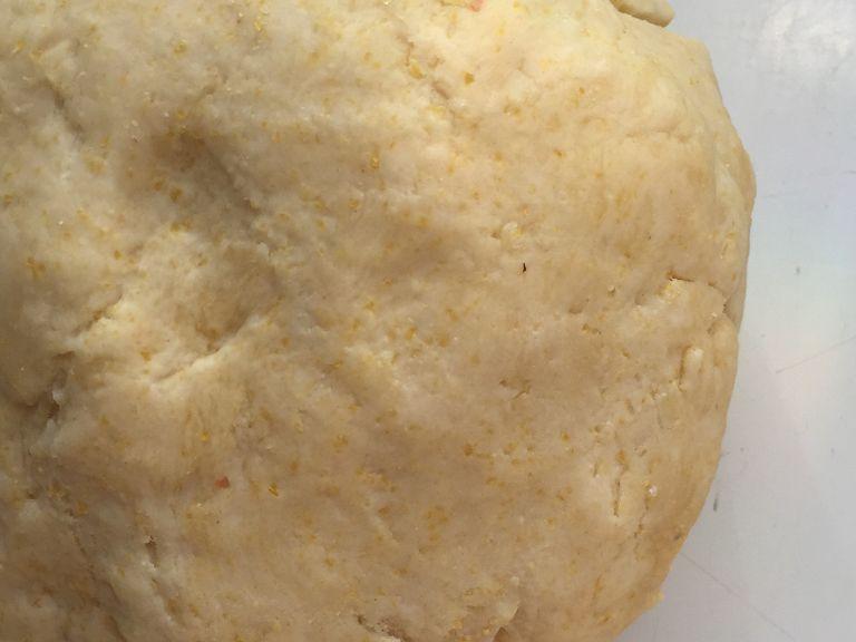 knead and shape into a ball. Keep in mind that this is a hard yet elastic dough (if it turns sticky or liquidy, add more flour). If done correctly, it shouldn’t stick to your hands or working surface.