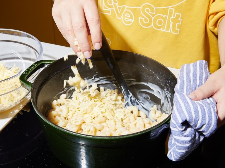 Once simmering, add pasta and a hefty pinch of salt. Let cook approx. 8 – 10 min., or until pasta is al dente. Remove from heat and stir in cheddar cheese until completely melted and creamy. Season with salt, pepper, and nutmeg to taste. Enjoy!
