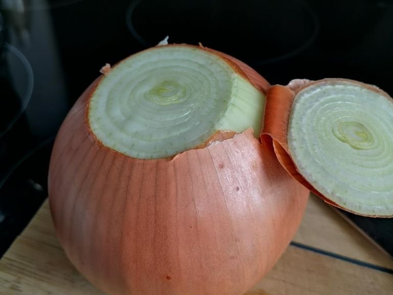 For this recipe, a very large onion would suffice, otherwise please use 4 normal sized onions. cut the top and root off.